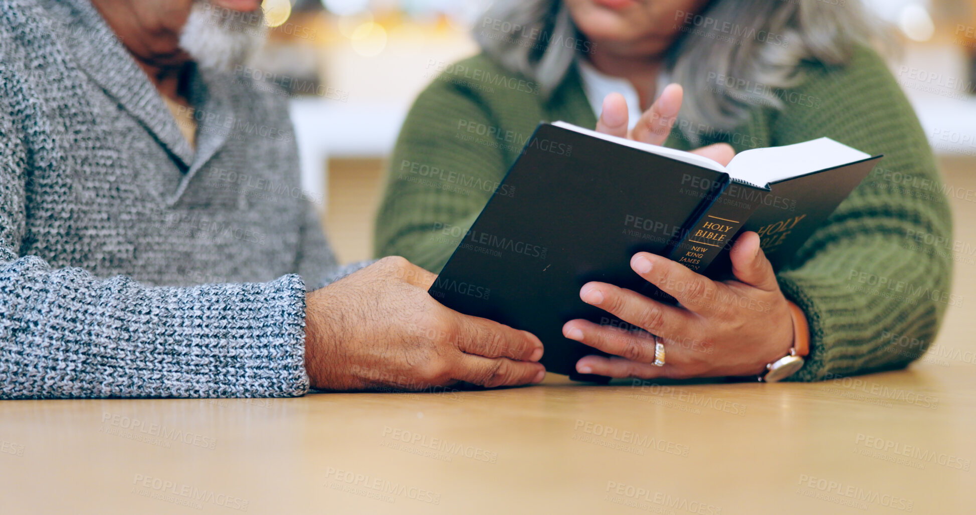 Buy stock photo Reading book, hands or old couple with bible in home for faith, religion or God with hope in house. Studying Jesus Christ, worship or senior Christian people learning literature or spiritual prayer 