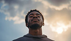 Close-up portrait of young black male. Eyes closed. Peaceful, prayer.
