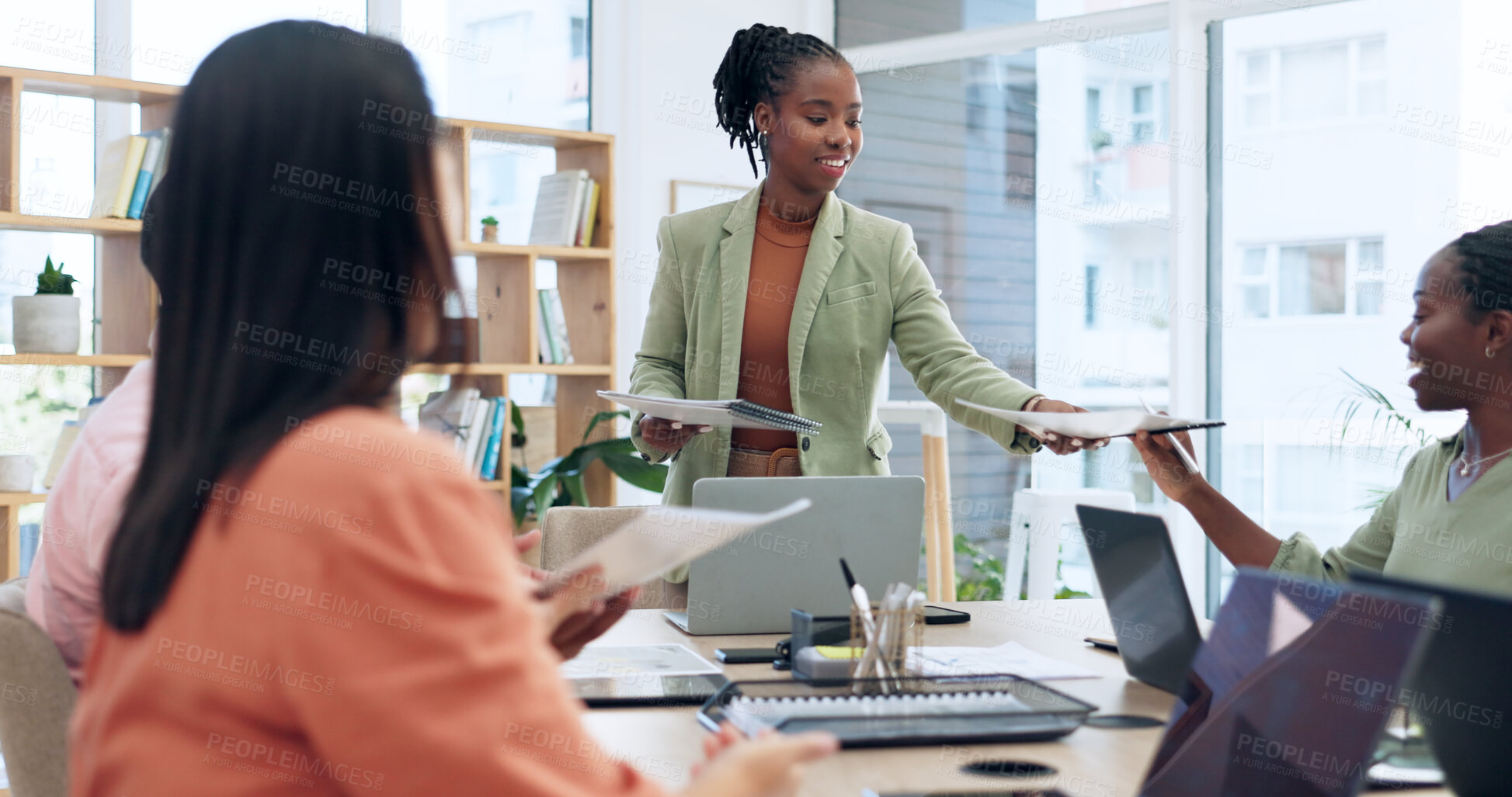 Buy stock photo Business people in office for meeting with documents, proposal and laptop in workshop. Planning, strategy and management with women at table with paperwork, teamwork and project development report.