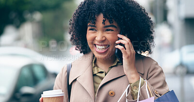 Happy woman, smile and phone for communication on street while walking, coffee cup and shopping bags. African person, curly hair and excitement for conversation on commute to work in city for meeting