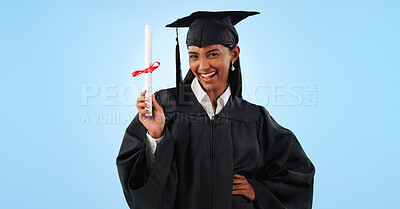 Buy stock photo Graduate woman, certificate and portrait in studio with pride, success and achievement by blue background. Graduation, girl and diploma with award, celebration or paperwork for future from university