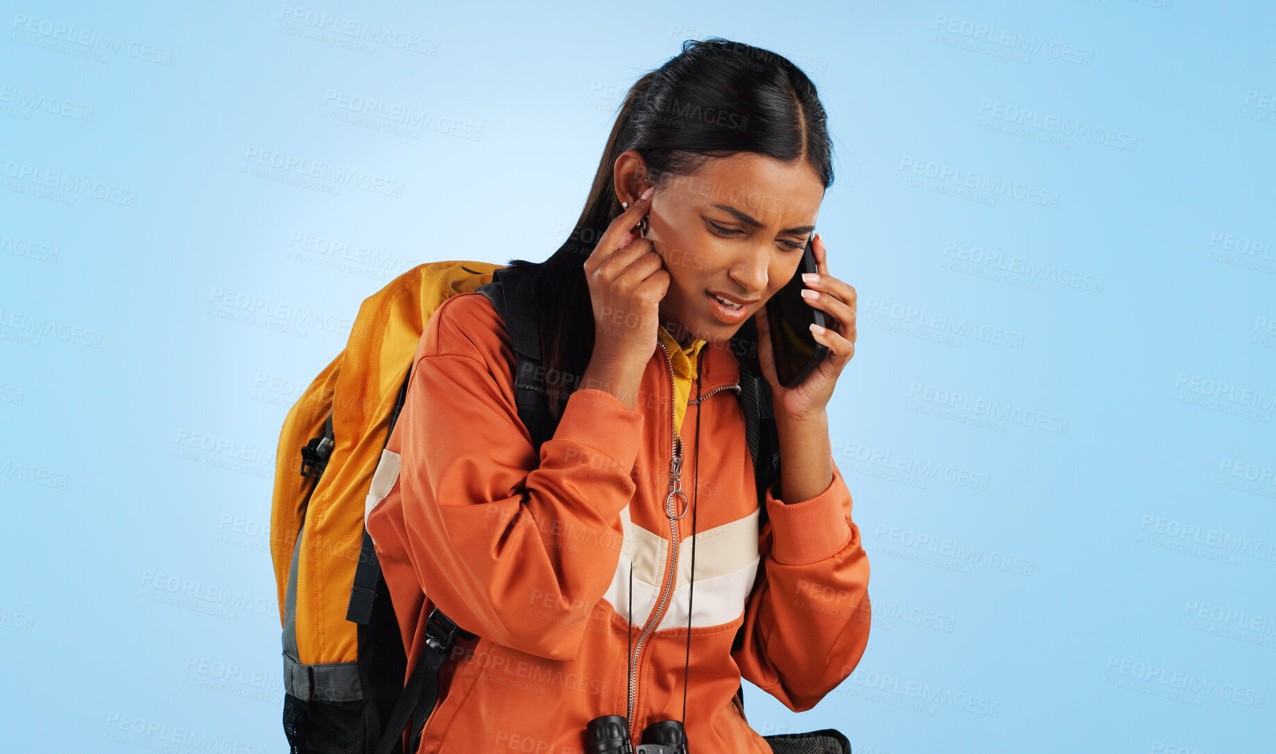 Buy stock photo Hiking studio, phone call problem and woman stress over trekking, backpacking and holiday travel crisis. Camper, smartphone communication fail or person with bad network connection on blue background