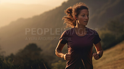 Contrasted shot of trail runner on mountain in sunset. Fitness, sport, runner Concept.