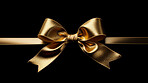 Golden bow on black background. Gift, present, decor for birthday, Valentine or christmas