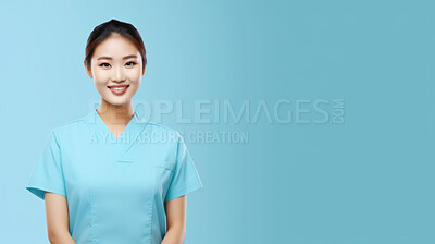 Buy stock photo Friendly medical doctor or nurse in blue uniform scrubs on copyspace background.