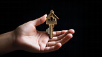 Hand holding keys to new home. Buying real estate, housing, apartments.