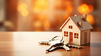 Key with a house shape keychain. Real estate, home owner or home loan concept