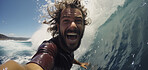 Close-up action selfie of surfer riding wave.Extreme sport concept.