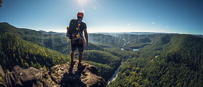 Wide shot of hiker on mountain top. Extreme sport concept.