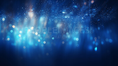 Blue glitter glow particle bokeh background. Festive celebration wallpaper concept