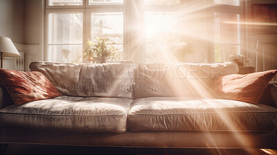 Sunlight on sofa couch in living room. Cozy natural light interior design