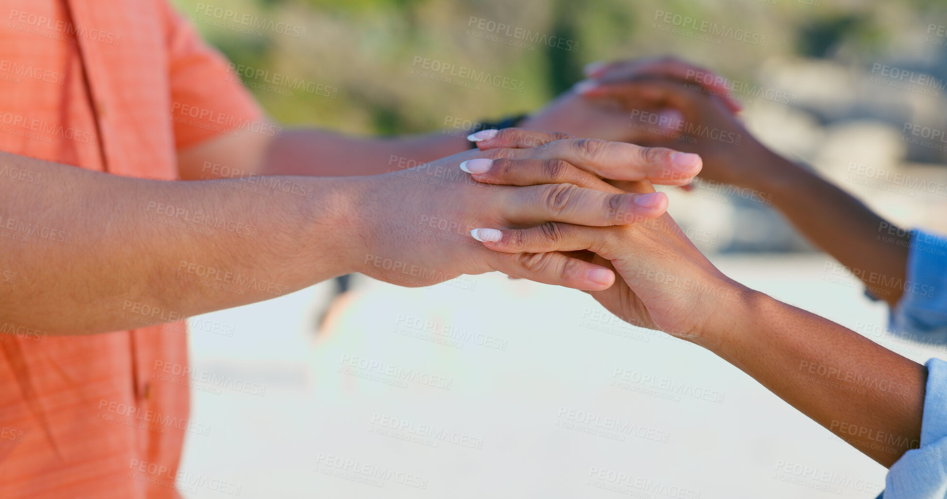 Buy stock photo Zoom, love and couple holding hands at a beach with respect, gratitude and trust in nature together. Commitment, closeup and people together at sea with support, kindness and summer travel freedom