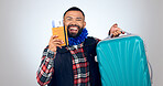 Happy man, suitcase and plane ticket for travel, excited about trip in portrait isolated on white background. Luggage, holiday and booking paperwork with passport and ready for adventure in studio