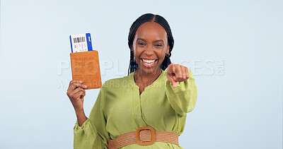Buy stock photo African woman, passport and studio portrait to point at you for airplane ticket, document and smile by blue background. Girl, paperwork and emoji for compliance, immigration and international travel
