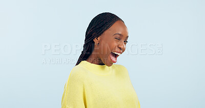 Buy stock photo Wink, flirty and portrait of a black woman on a studio background for love, conversation or a smile. Happy, mockup space and an African person with facial expression for a secret or confident