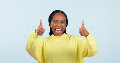 Buy stock photo Portrait, smile and black woman with thumbs up, support and decision on a blue studio background. Face, African person and model with hand gesture, opportunity and feedback with review and emoji