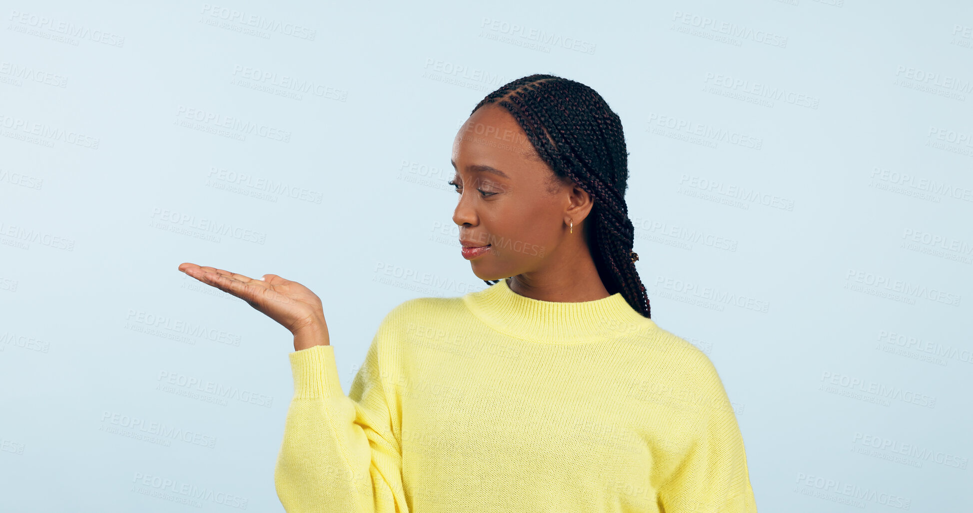 Buy stock photo Woman, palm and advertising space in studio of announcement, mockup or promotion on blue background. African model show hand for presentation of choice, decision or feedback of deal, opinion or offer