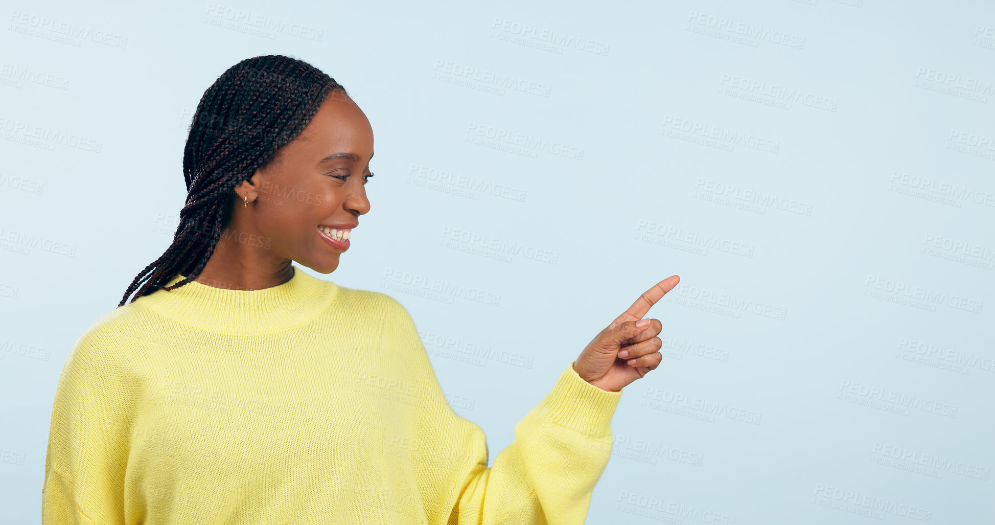 Buy stock photo Pointing, smile and black woman with opportunity, decision and announcement on a blue studio background. African person, model and girl with hand gesture, mockup space and choice with news or sale
