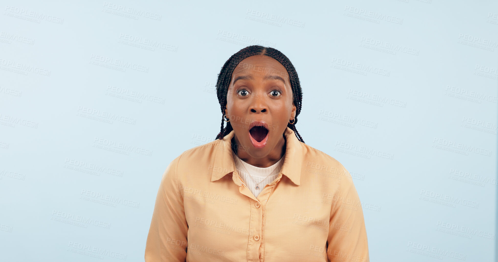 Buy stock photo Portrait, black woman and surprised in studio, shocked or wow emoji for gossip, drama or announcement. Person, face and omg emotion for notification, news or overwhelmed on blue background or mockup
