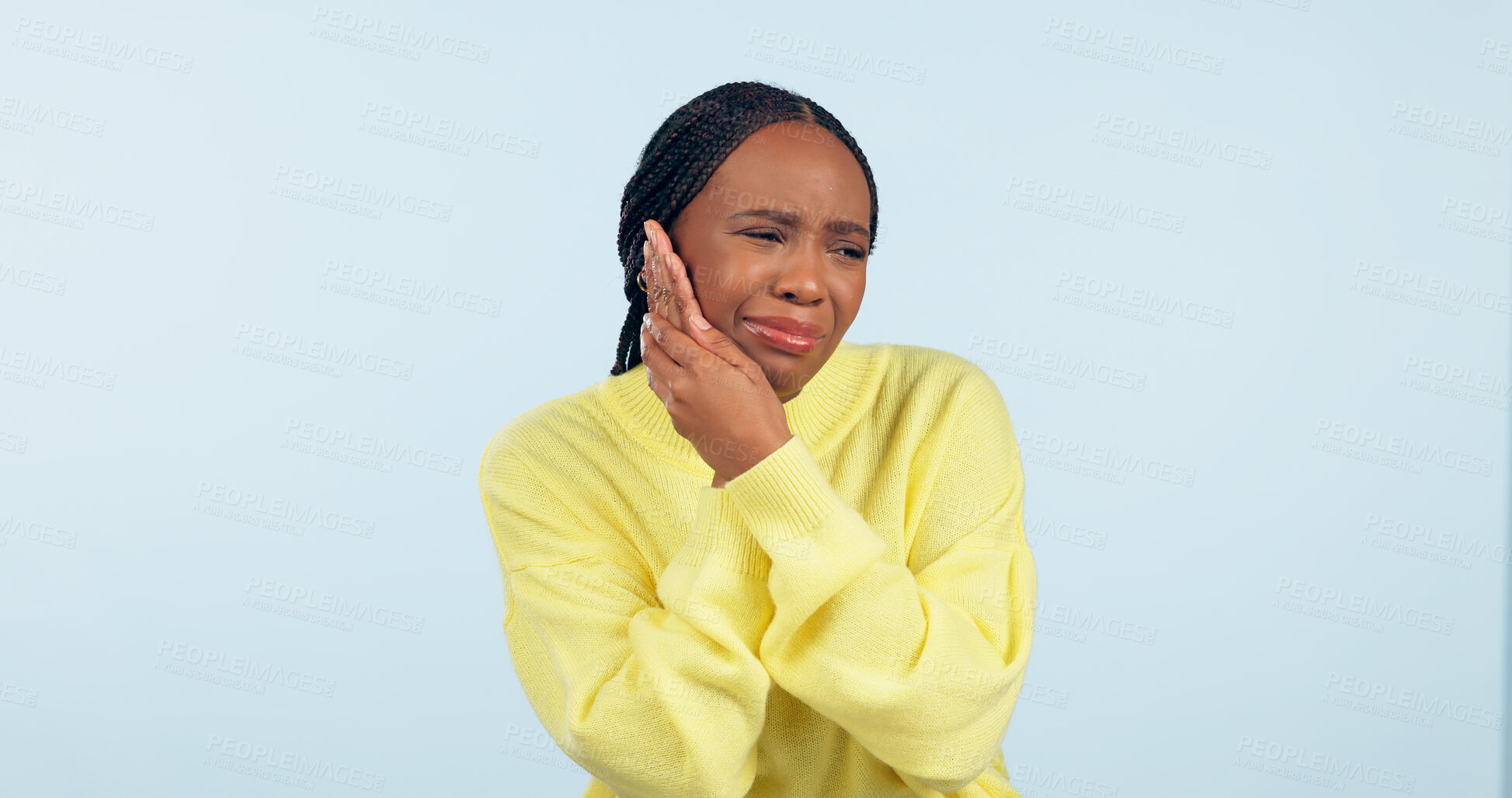 Buy stock photo Black woman, toothache and inflammation with pain, unhappy and uncomfortable on isolated studio background. Dental problem, teeth and mouth for cavity, sore and pressure with hands, gums or infection