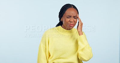 Buy stock photo Woman, pain and headache in studio for stress, challenge and fatigue of mental health on blue background. African model massage temple for anxiety, brain fog or tired of migraine, vertigo and burnout