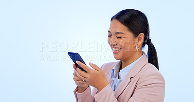Buy stock photo Business, woman and phone in studio for search, networking and planning with happy expression on blue background. Person, smartphone or technology for scrolling on social media or website on mock up