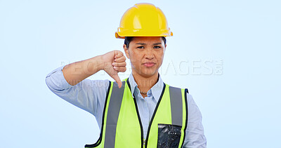 Buy stock photo Woman, thumbs down and engineer for construction by architect in studio by blue background. Asian female, development and negative review for real estate fail, inspection and dislike in mockup