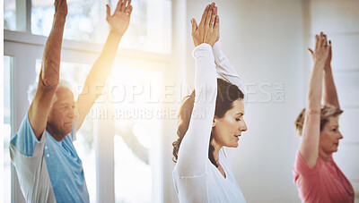 Buy stock photo Shot of a teacher taking two seniors through a yoga class