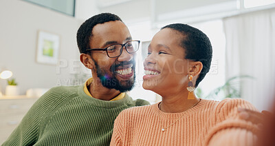 Buy stock photo Black couple, selfie and home with love, support and care together on a living room sofa with smile. Date, social media and happy people in the morning with communication and bonding in a lounge