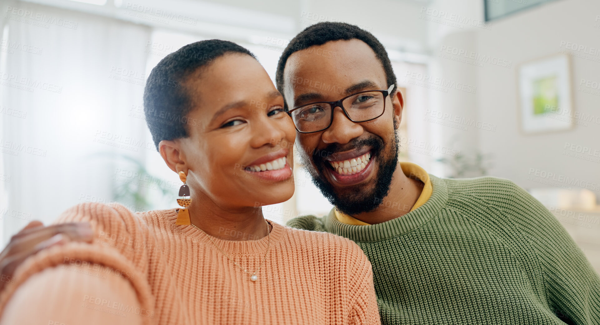 Buy stock photo Black couple, selfie and home with love, support and care together on a living room sofa with smile. Date, portrait and  happy people in the morning with communication and bonding with social media