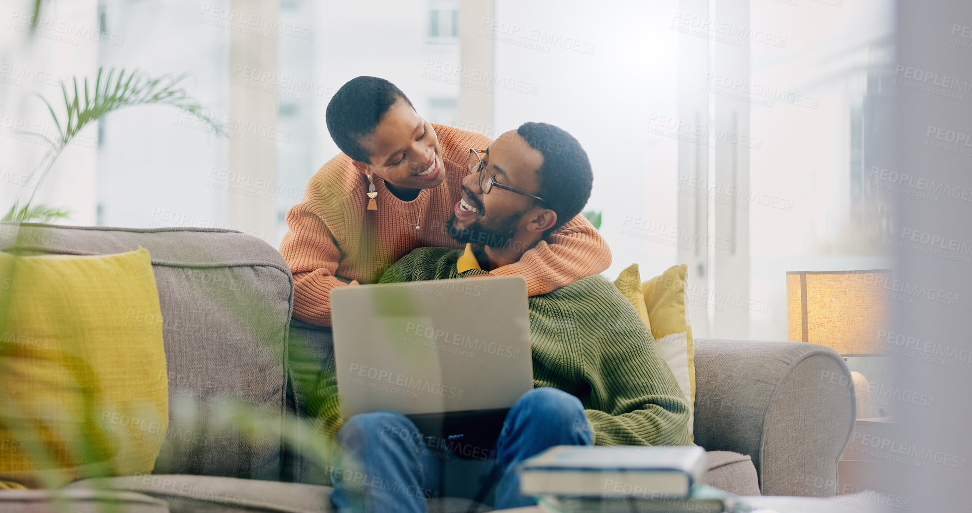 Buy stock photo Laptop, love and black couple hug, smile and happy for home romance, partner support or marriage news. Care, lounge sofa and African man, woman or people embrace for online relationship test results