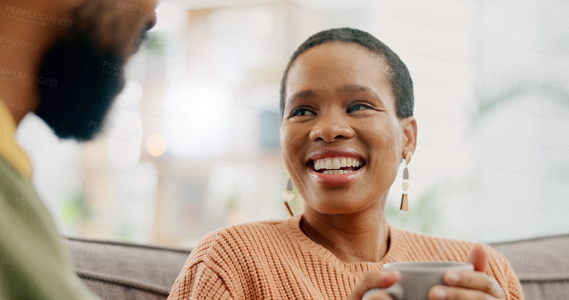 Buy stock photo Coffee, conversation and happy woman at home on a living room sofa with a man and hot drink. Couple, tea and smile with communication and discussion together with love and support talk on a couch