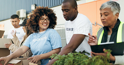 Buy stock photo Group of people, volunteer and checklist for food boxes on table for charity with care, kindness and help. Donation, men and women at ngo with grocery inventory for distribution at non profit project