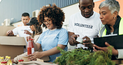 Buy stock photo Group of people, volunteer and checking food boxes on table for charity with care, kindness and help. Community donation, happy men and women at ngo with grocery checklist at non profit project event