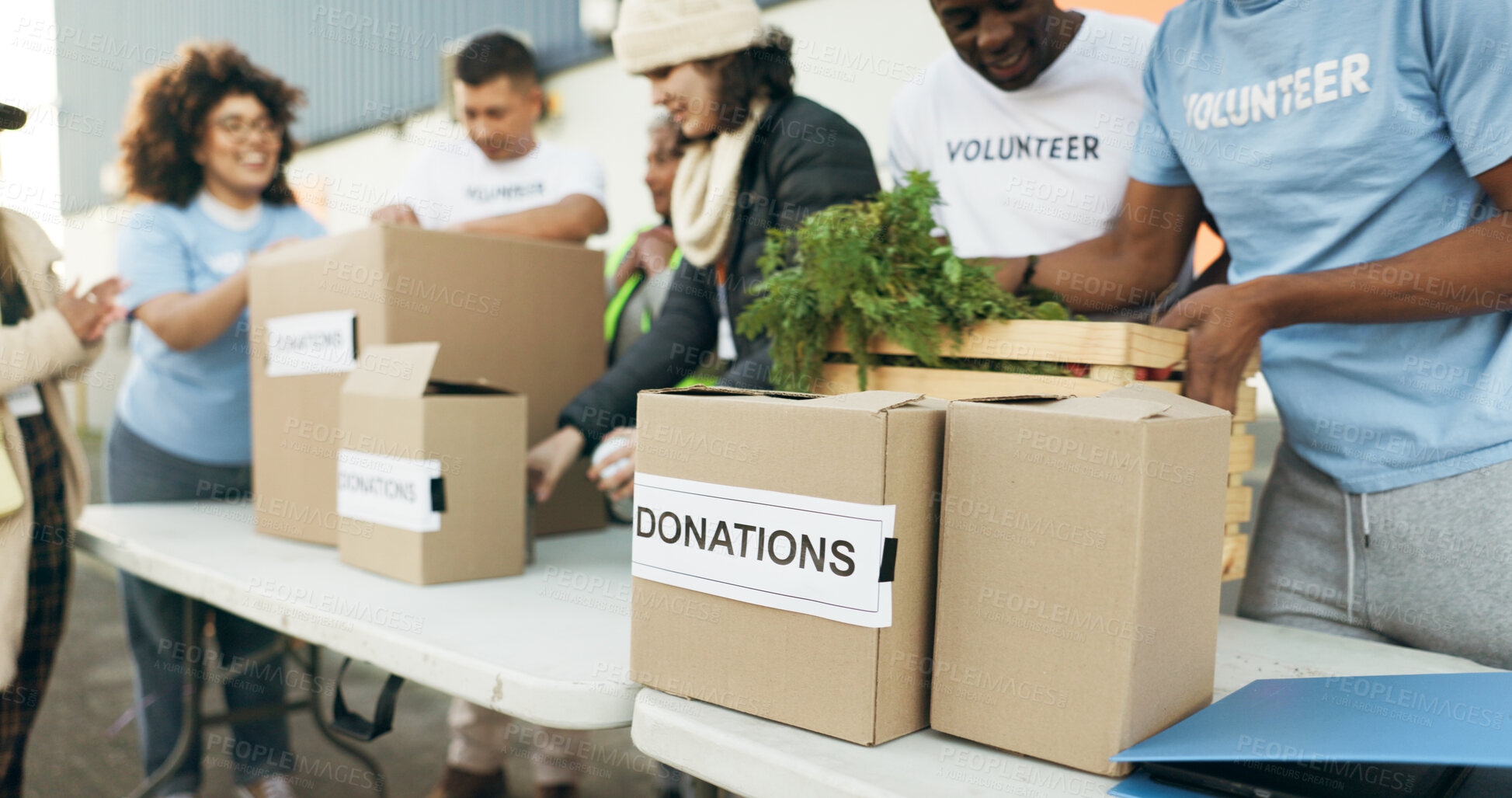 Buy stock photo Group of people, volunteering and food boxes on table for charity event with care, kindness and trust. Community donation, men and women at ngo with grocery package distribution at non profit project