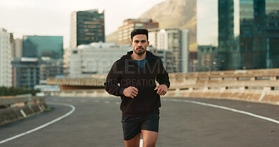 Buy stock photo Man, morning and running in city street, road and bridge for fitness, workout and marathon training. Athlete, person or exercise in South Africa for cardio wellness, health or triathlon performance