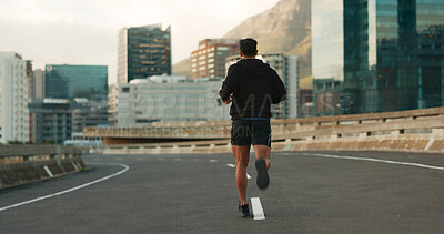 Sports, back and running in morning on city, street and bridge for fitness, workout and marathon training. Athlete, man or exercise on South Africa road for wellness, health or triathlon performance