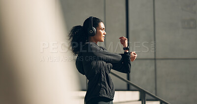 Buy stock photo Runner woman, headphones and warm up on stairs for music, vision and ideas in city, workout and training. Girl, thinking and listen on steps with streaming subscription, wellness and stretching arms