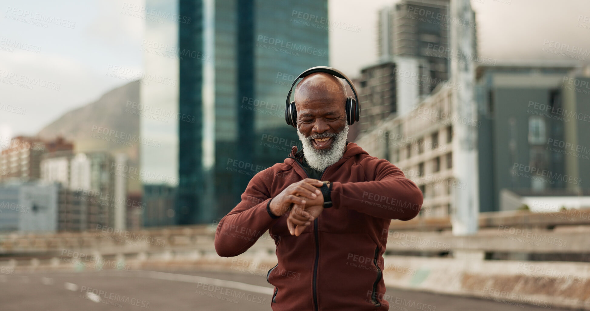 Buy stock photo Man, music and smart watch in city for exercise, fitness performance and workout results. Happy senior african runner check timer, clock and healthy training progress with headphones in urban road 