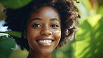 Happy woman with radiant health skin. Portrait of young female surrounded by plants