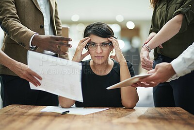Buy stock photo Cropped portrait of a young businesswoman feeling overwhelmed by her colleagues in the office