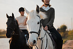 Horse ride, freedom and hobby with friends in nature on horseback by the lake during a summer morning. Countryside, equestrian and female people riding outdoor together for travel, fun or adventure