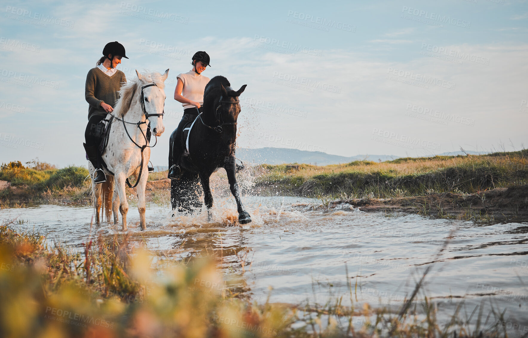 Buy stock photo Horse riding, friends and girls at lake in countryside with outdoor mockup space. Equestrian, happy women and animals in water, nature and adventure to travel, journey and summer vacation together.