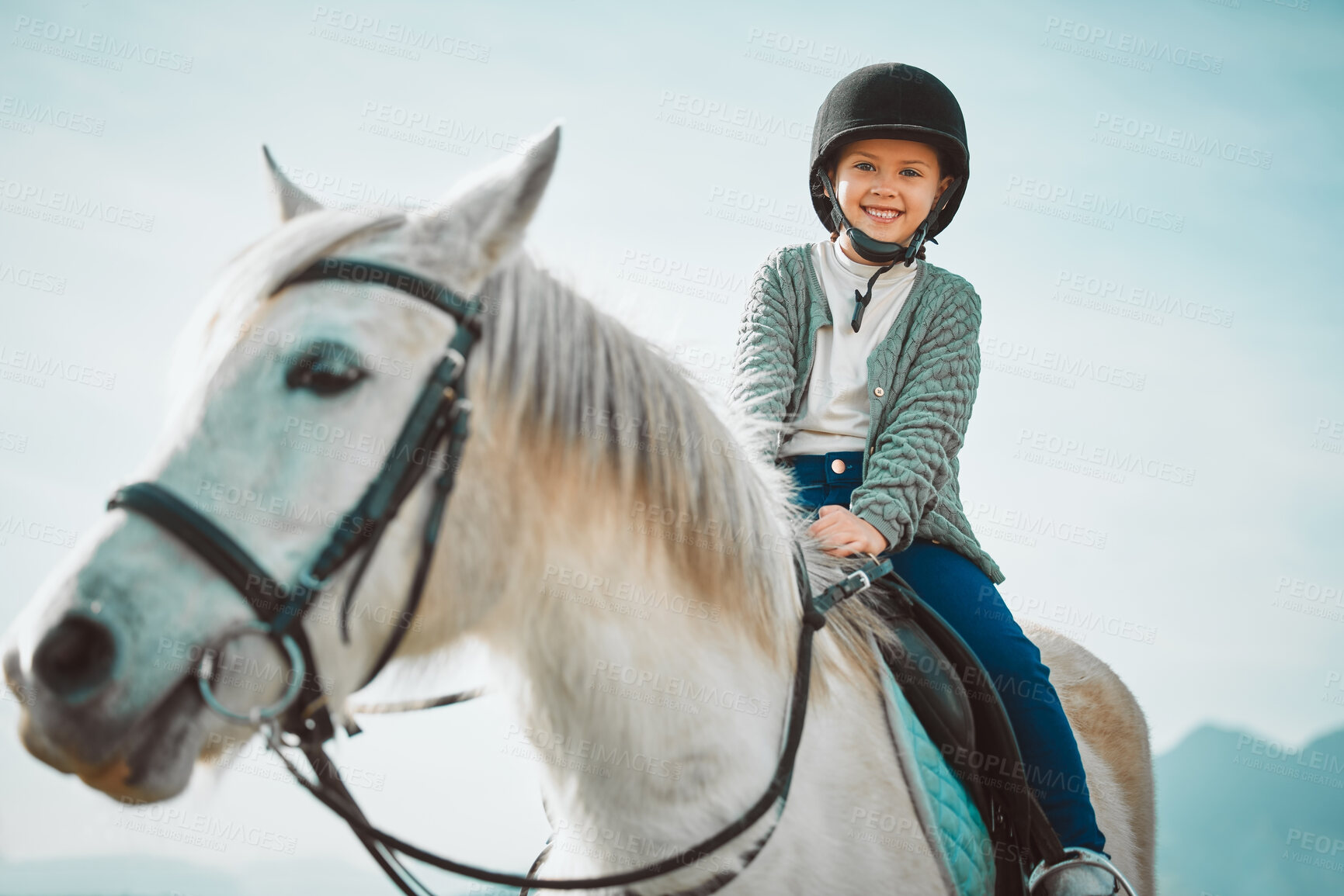 Buy stock photo Ranch, happy and girl child on a horse to practice riding for a championship, competition or race. Happiness, animal and kid with smile practicing to ride a pony pet on a field or farm in countryside