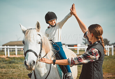 Buy stock photo High five, horse or children with a coach and girl training for equestrian outdoor on a farm or ranch. Motivation, teacher and horseback with a female kid in celebration with her riding instructor