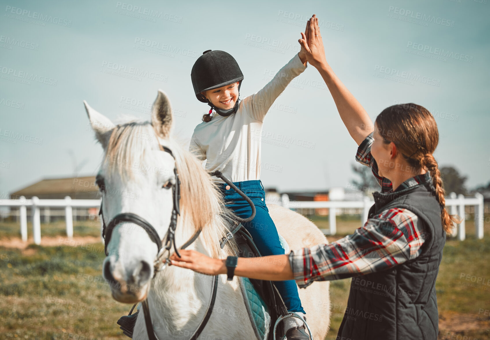 Buy stock photo High five, horse or children with a coach and girl training for equestrian outdoor on a farm or ranch. Motivation, teacher and horseback with a female kid in celebration with her riding instructor