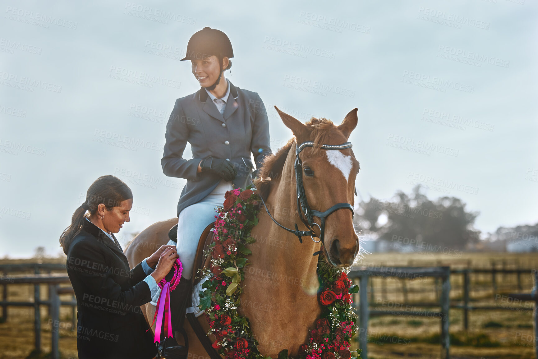 Buy stock photo Woman, horse and winner of equestrian competition with ribbon award for sports achievement. Athlete person on animal for horseback riding, race and training for badge prize with pride in countryside