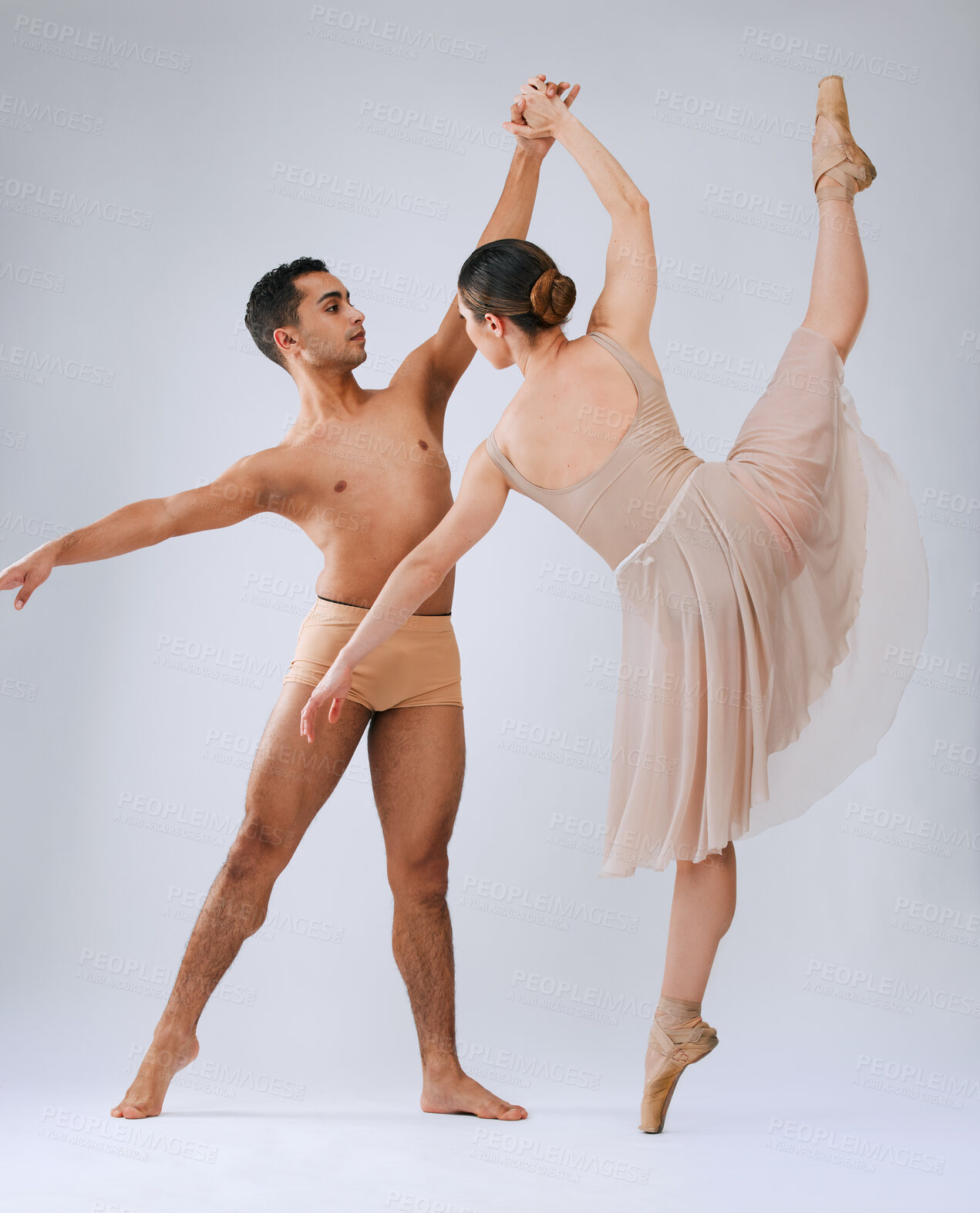 Buy stock photo Ballet dancing couple, studio and holding hands for balance, finesse and art movement for beauty in class. Young dancer team, performance or man with woman in class for fitness, teamwork and focus