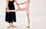 Closeup, ballet and mentor with girl, balance and practice for performance, routine and fitness. Zoom, female ballerina and trainer help with training, legs and learning for show and dancing academy