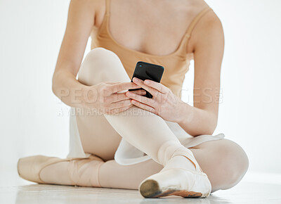 Buy stock photo Phone, ballet and closeup of woman dancer networking on social media, mobile app or the internet. Technology, art and female ballerina scroll on website with cellphone at practice for performance.